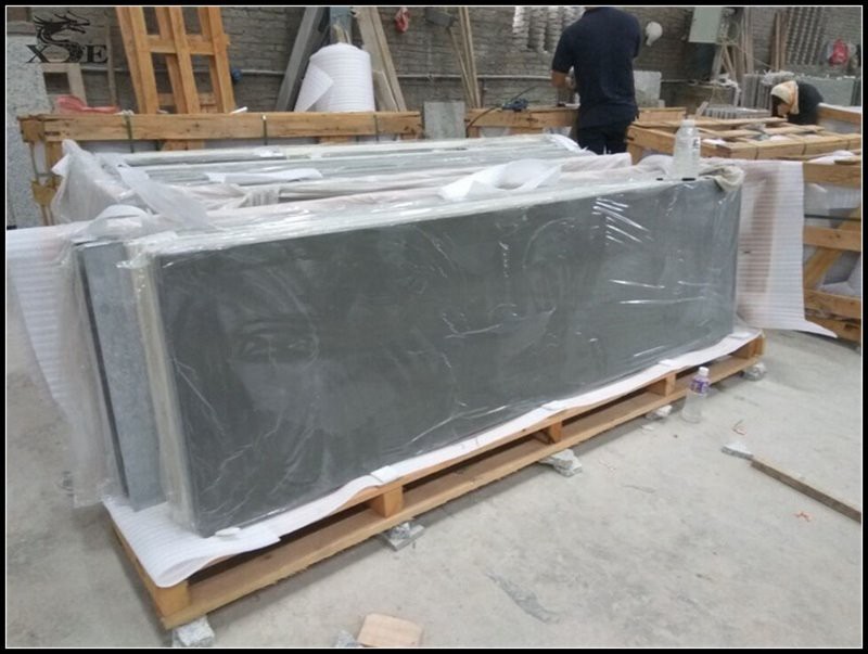 grey quartz countertops with oak cabinets