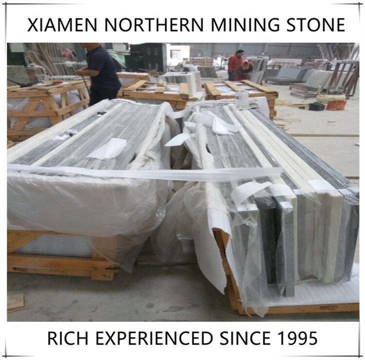 grey quartz countertops with white cabinets