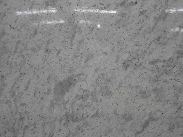 Close view of Andromeda granite polished surface and mineral pattern Close view of Andromeda granite polished surface and mineral pattern