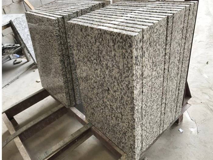 Tiger Skin White granite countertop pieces with natural gray mineral movement Tiger Skin White granite countertop pieces with natural gray mineral movement