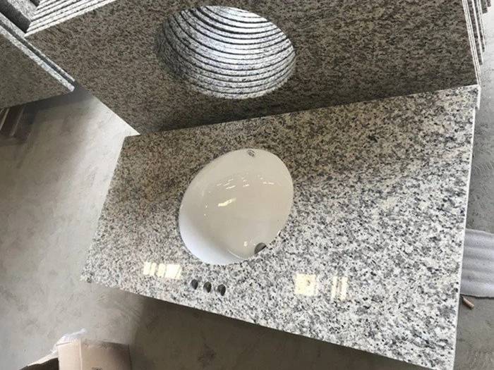 Tiger Skin White granite vanity top with undermount sink and faucet holes Tiger Skin White granite vanity top with undermount sink and faucet holes