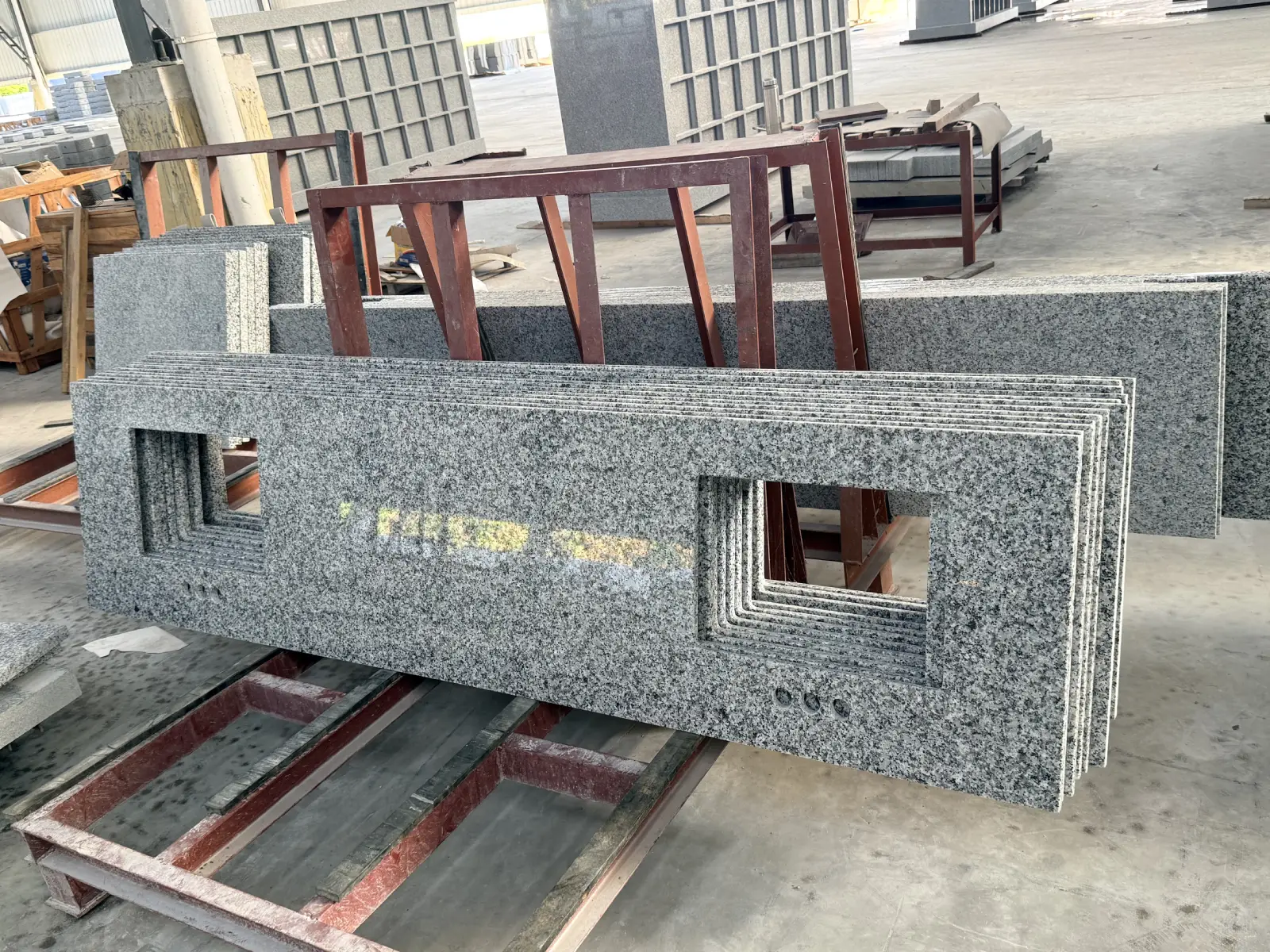 Cambodia Luna Pearl Granite Countertop Cambodia Luna Pearl granite countertop pieces with sink cutouts